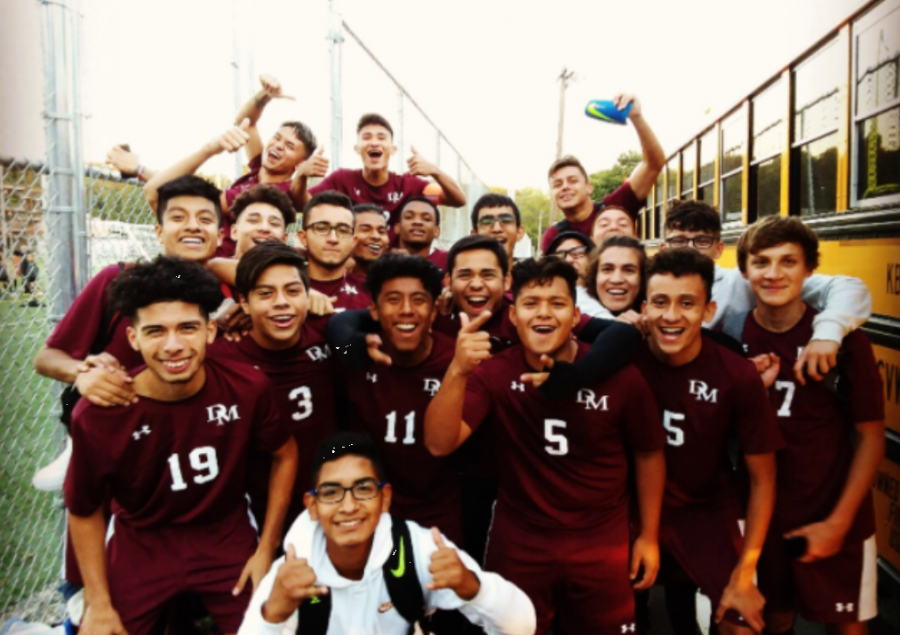 Varsity soccer team celebrates their win