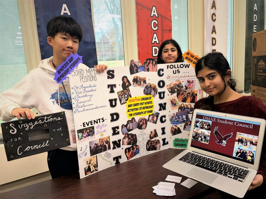 Students promote Student Council at Club Fair. Above, l to r: freshmen Woozoo Han and Ria Vij, and senior Khushi Panchal.