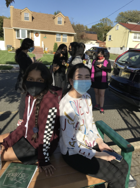 The girls tennis team before practice.